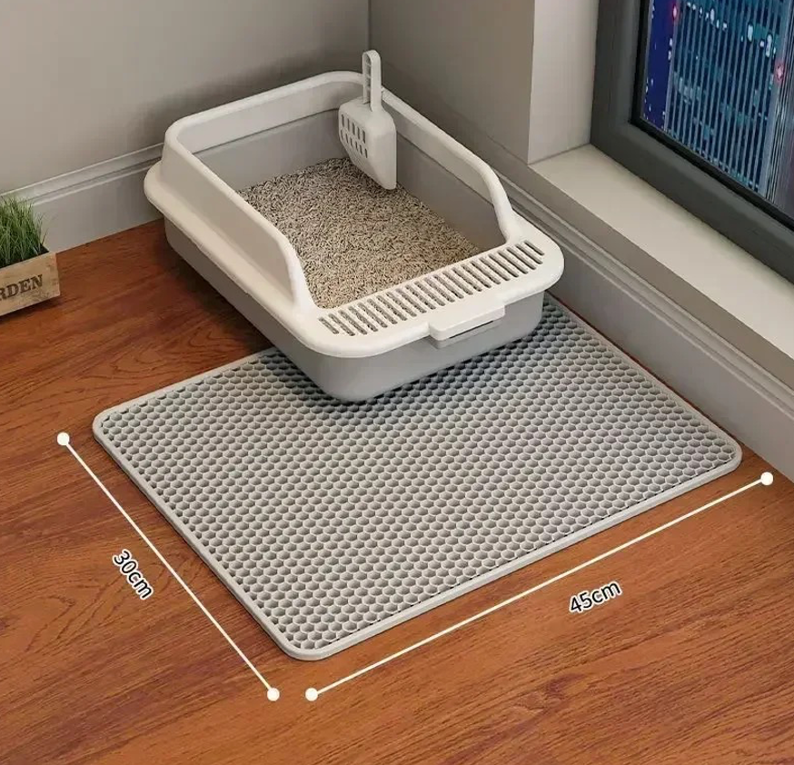 Double layer trapping mat